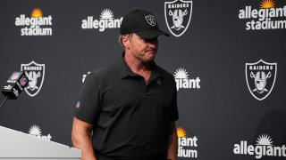 FILE - Las Vegas Raiders head coach Jon Gruden leaves after speaking during a news conference after an NFL football game against the Chicago Bears in Las Vegas, in this Sunday, Oct. 10, 2021, file photo. Jon Gruden is out as coach of the Las Vegas Raiders after emails he sent before being hired in 2018 contained racist, homophobic and misogynistic comments. Gruden released a statement Monday night, Oct. 11, 2021, that he is stepping down after The New York Times reported that Gruden frequently used misogynistic and homophobic language directed at Commissioner Roger Goodell and others in the NFL.