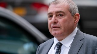 Lev Parnas walks past criminal court, Monday, Oct. 18, 2021, in New York. Parnas, a onetime associate of Rudy Giuliani, is accused along with a co-defendant of making illegal campaign contributions.