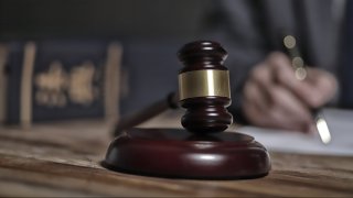 A gavel is shown on a desktop in this undated image.