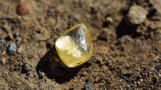 a 4.83-carat yellow diamond