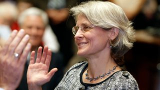 In this Nov. 28 2011 file photo, long-time gay rights advocate Beth Robinson takes the oath of office on Monday, Nov. 28, 2011, in Montpelier, Vt. As voted by reporters and editors from Vermont AP members, Robinson was voted one of the top stories in Vermont in 2011.