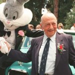 Mel Blanc poses with Bugs Bunny at his 80th birthday party in Los Angeles, June 2, 1988.
