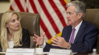 Lael Brainard,, left, and Jerome Powell