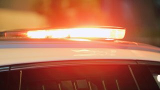 Close-up of the red lights on top of a police vehicle.