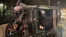 A Virginia State Police cruiser overturned on Interstate 95 after being rammed by the driver of a Malibu, police say.
