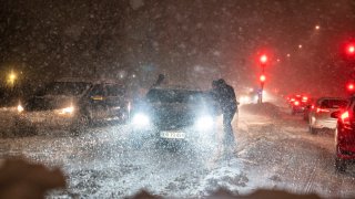 A snowstorm causes chaos on the roads around Aalborg, Denmark,