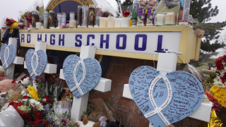 A memorial outside of Oxford High School continues to grow on December 03 2021 in Oxford, Michigan.