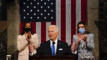 President Joe Biden, center, speaks during a joint session of Congress at the U.S. Capitol in Washington, D.C., April 28, 2021.