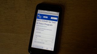 A COVID-19 patient's iPhone receives its daily contract tracing message from the city of New York