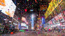 Times Square sits empty while fireworks and confetti go off during the 2021 New Year's Eve celebration in Times Square, Jan. 1, 2021, in New York City.
