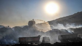pollution caused by truck and coal-loading activity at a coal mine