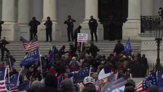 At the U.S. Capitol Thursday, members of Congress marked one year since the attack there. Two lawmakers from Texas who were there at the time are also taking a look back.