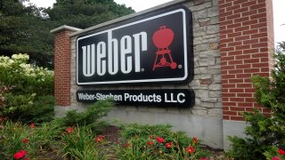 A sign marks the location of the corporate headquarters for Weber grills
