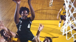 College Basketball: AIAW Final: Delta State Lusia Harris (45) in action, layup vs LSU at Williams Arena. DSU won the tournament and Harris was the MVP of the tournament. Minneapolis, MN 3/26/1977