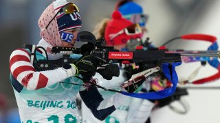 Clare Egan of Team United States shoots during the 4x6-kilometer mixed relay at the 2022 Winter Olympics, Saturday, Feb. 5, 2022, in Zhangjiakou, China.