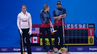 Canada's Rachel Homan, looks at her team mate, during the mixed doubles match against the United States, at the 2022 Winter Olympics, Saturday, Feb. 5, 2022, in Beijing.