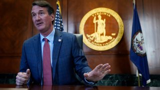 Virginia Gov. Glenn Youngkin, gestures during an interview in his office at the Capitol Tuesday Feb. 15, 2022