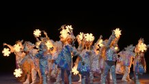 Children perform during the Closing Ceremony at the 2022 Winter Olympic Games, Feb. 20, 2022, in Beijing.