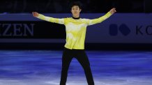 Nathan Chen makes his way to the podium to collect his gold medal during the ISU Grand Prix of Figure Skating Final, Dec. 7, 2019, in Turin, Italy.