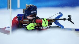 Marte Olsbu Roeiseland of Team Norway shoots during the Biathlon Women's 10km Pursuit at the 2022 Winter Olympics at National Biathlon Centre, Feb. 13, 2022, in Zhangjiakou, China.