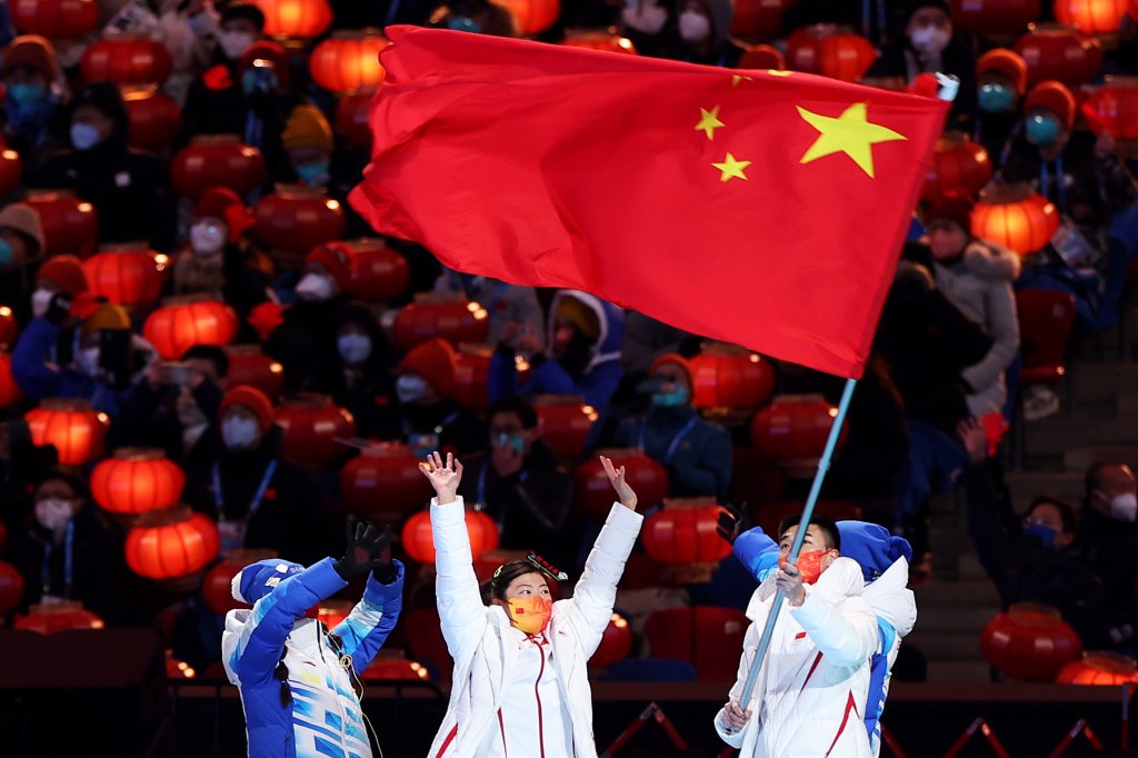Tingyu Gao of Team China waves the flag of China during the 2022 Winter Olympics Closing Ceremony, Feb. 20, 2022, in Beijing, China. 