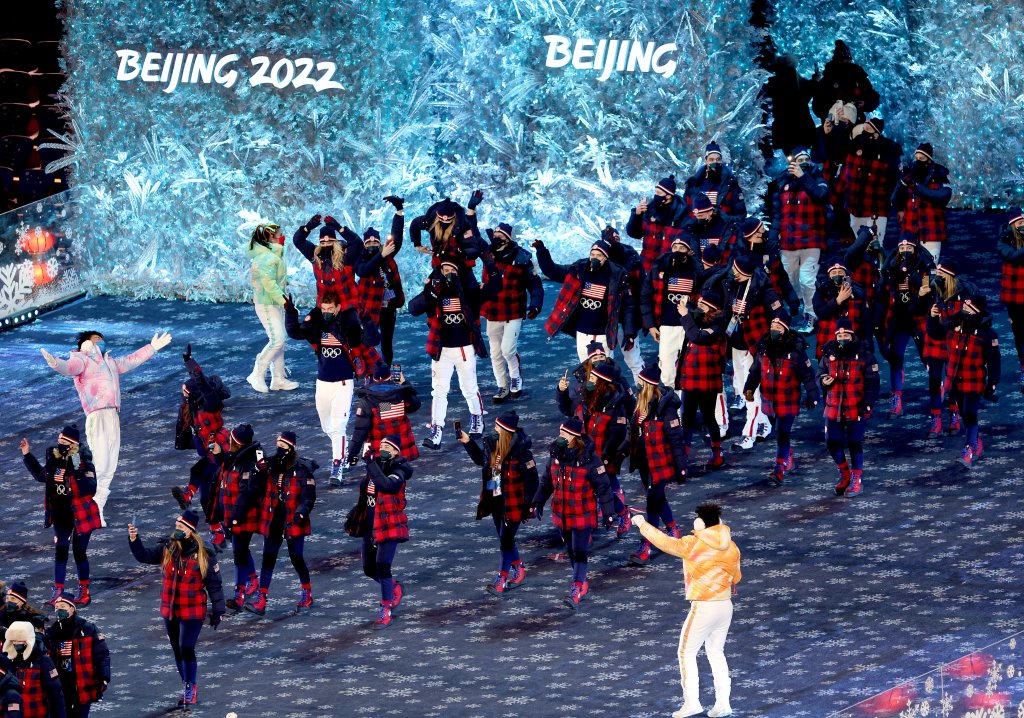 Members of Team United States make their way into Beijing National Stadium during the 2022 Winter Olympics Closing Ceremony, Feb. 20, 2022, in Beijing.