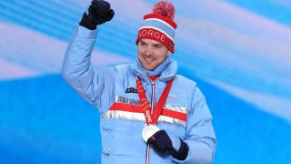 Silver medallist, Joergen Graabak of Team Norway celebrates during the Individual Gundersen Normal Hill/10km medal ceremony