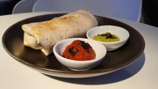 The burrito in the Steigenberger Grandhotel Belvedere came with a side of salsa and guacamole.