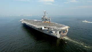 PACIFIC OCEAN (July 26, 2012) - The U.S. Navy's forward-deployed aircraft carrier USS George Washington (CVN 73) transits through Tokyo Bay as it returns to its forward-operating location of Yokosuka, Japan.