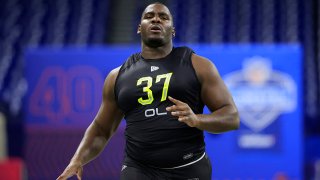 Washington Commanders draft pick Chris Paul running the 40-yard dash during the NFL Combine at Lucas Oil Stadium March in Indianapolis.