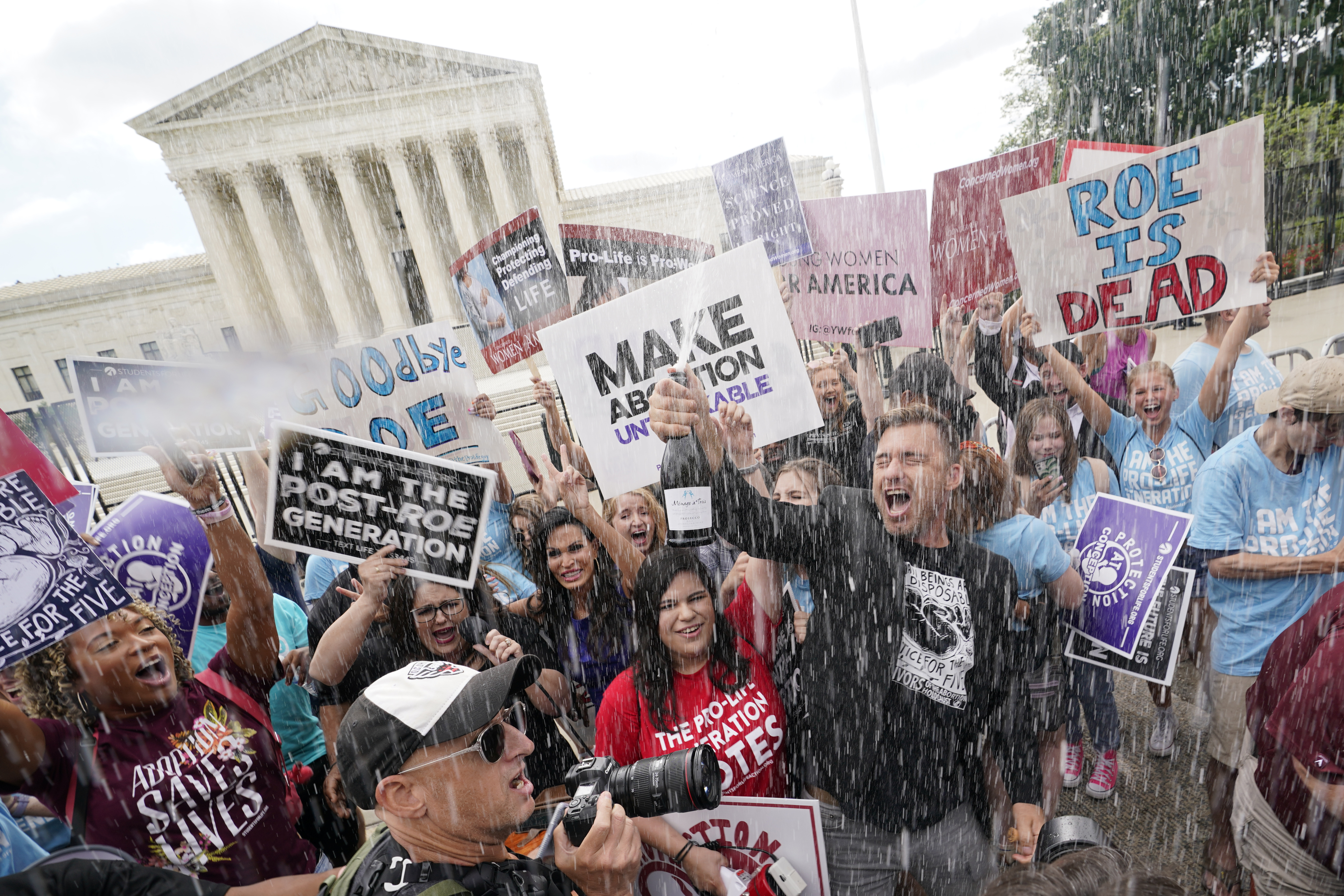 A celebration outside the Supreme Court, Friday, June 24, 2022, in Washington.