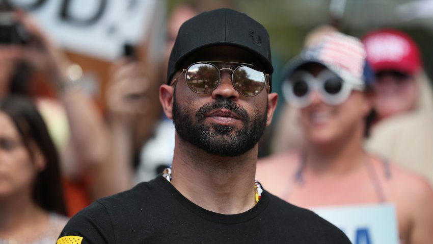 ORLANDO, FLORIDA - FEBRUARY 27: Enrique Tarrio, leader of the Proud Boys, stands outside of the Hyatt Regency where the Conservative Political Action Conference is being held on February 27, 2021 in Orlando, Florida. Begun in 1974, CPAC brings together conservative organizations, activists, and world leaders to discuss issues important to them.