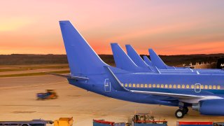 Servicing Passenger Jets at Airport Terminal