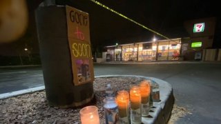 Items are left outside a Brea 7-Eleven in memory of an employee shot and killed there Monday July 11, 2022.