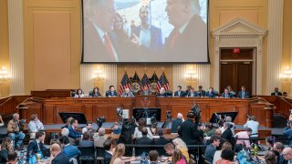 An image of former President Donald Trump talking to his chief of staff Mark Meadows is seen as Cassidy Hutchinson