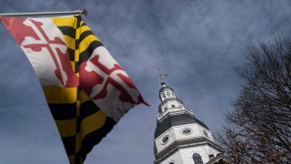 ANNAPOLIS MD – DECEMBER 28 The Maryland State House and state flag are seen on December 28, 2021 in Annapolis, Maryland. The Maryland legislature recently overturned the power of the Governor to override parole board recommendations.(Photo by Michael Robinson Chavez/The Washington Post via Getty Images)
