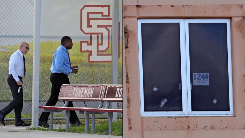 Assistant State Attorney Mike Satz, left, and Broward State Attorney Harold F. Pryor walk towards the entrance at Marjory Stoneman Douglas High School in Parkland on August 04, 2022 in Parkland, Florida. Jurors went to view the 1200 building, the crime scene where the 2018 shootings took place during this penalty phase in the trial of confessed shooter Nikolas Cruz who previously plead guilty to all 17 counts of premeditated murder and 17 counts of attempted murder. Cruz waived his right to be present at the viewing. (Amy Beth Bennett-Pool/Getty Images)