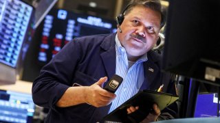 A trader works on the floor of the New York Stock Exchange (NYSE), July 27, 2022.