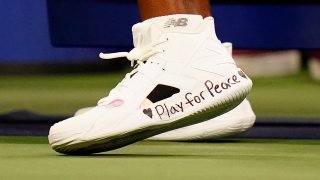 Coco Gauff shoes reading "Play for Peace"