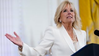 FILE - First lady Jill Biden speaks at an event in the East Room of the White House, June 15, 2022, in Washington. White House says the first lady has tested negative for COVID-19 and will return to the Washington, area on Tuesday, Aug. 30.