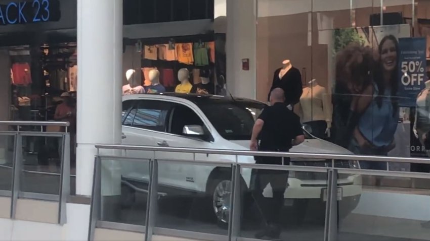 Video posted to social media shows a vehicle on the second floor of South Shore Plaza in Braintree, Massachusetts