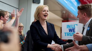 Conservative leadership candidate Liz Truss greets supporters as she attends a hustings event, part of the Conservative party leadership campaign, in Birmingham, Britain August 23, 2022.