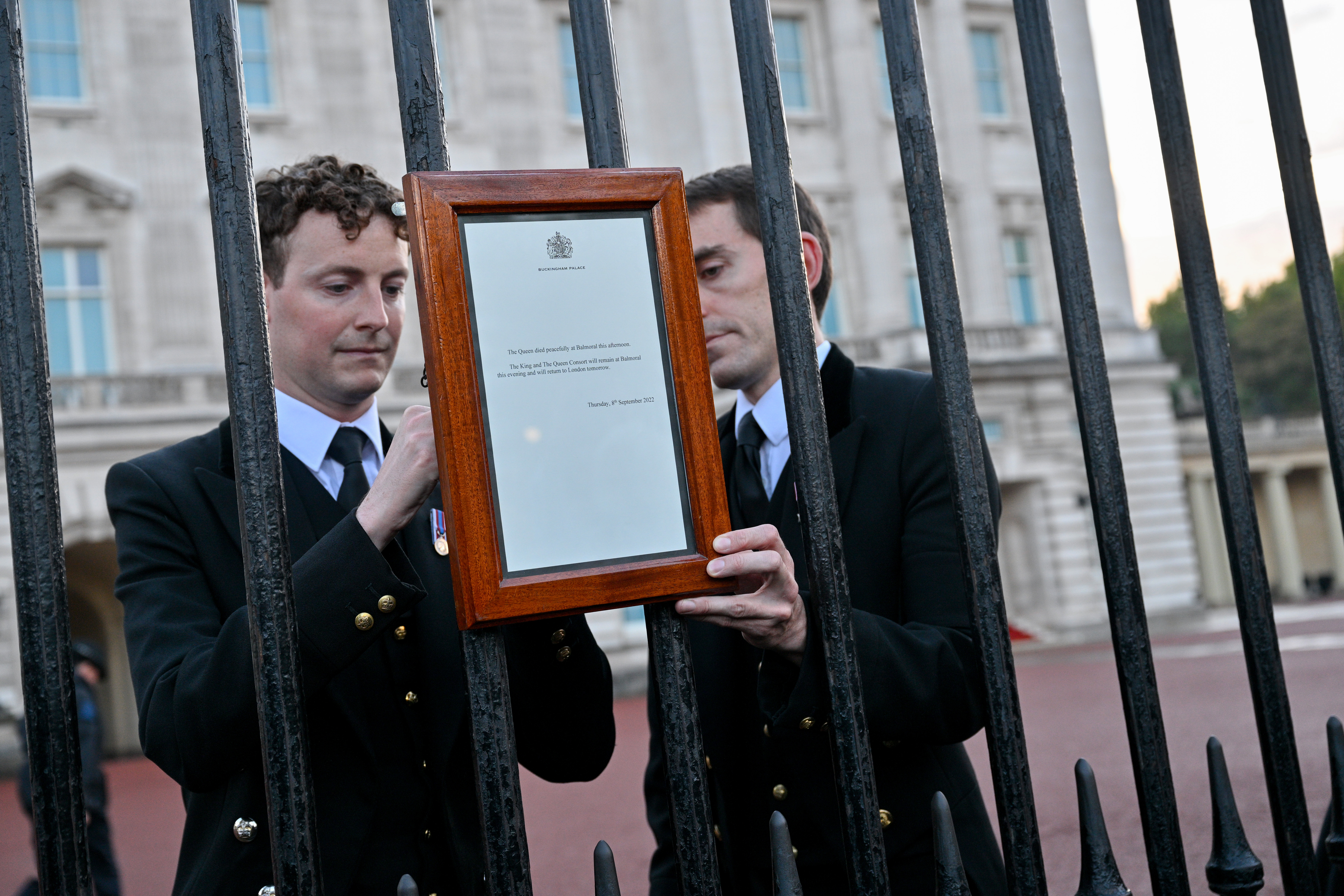 The official Royal announcement of the death of Queen Elizabeth II is placed on the gates of Buckingham Palace on Sept. 8, 2022, in London, England.