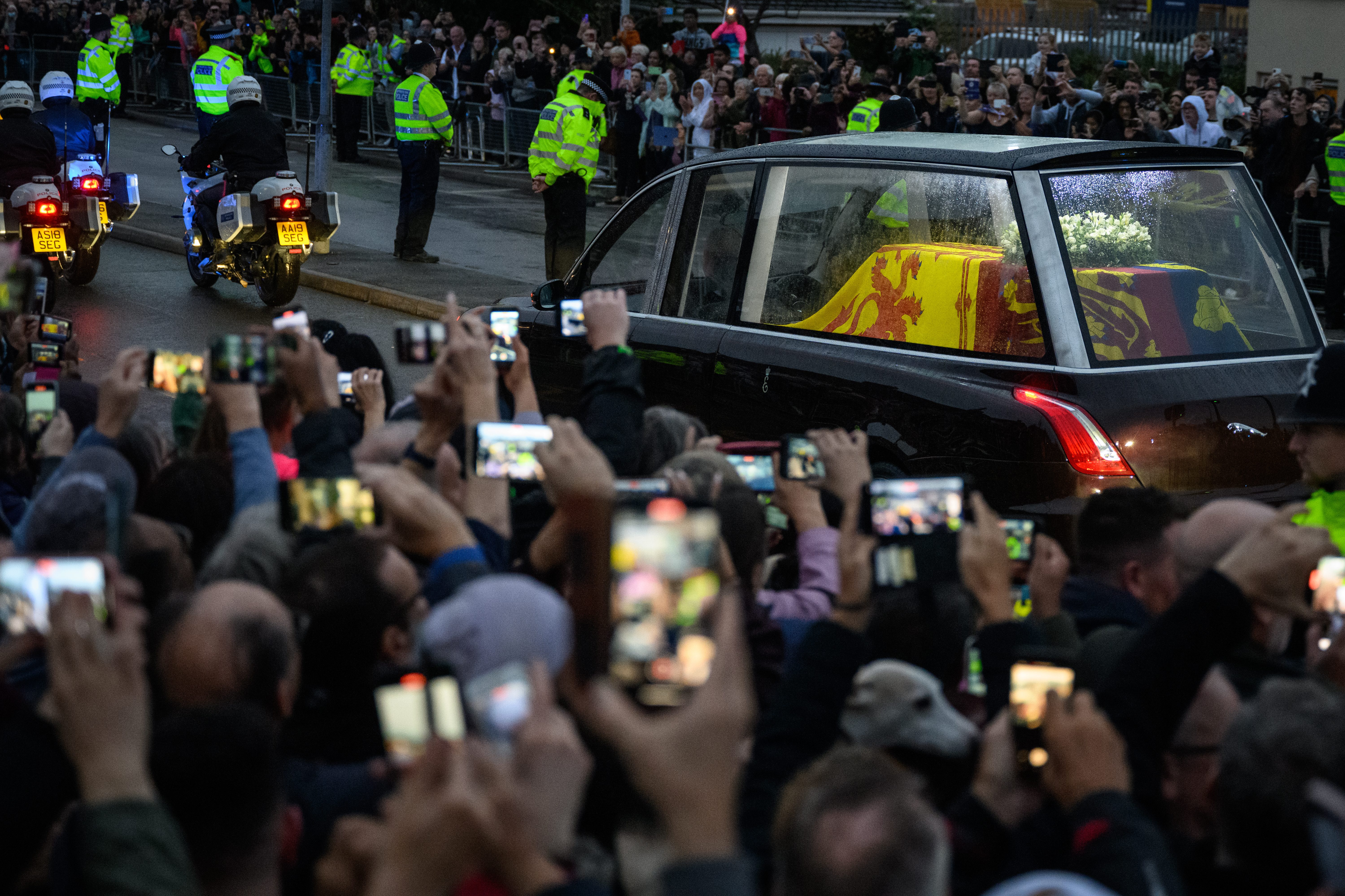 The coffin of Queen Elizabeth II leaves RAF Northolt, west London, from where it will be taken to Buckingham Palace, London, to lie at rest overnight in the Bow Room on September 13, 2022 in London, England.