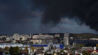 Smoke rises above the buildings after the Russian missile attack on the critical infrastructure of Lviv on Oct. 10, 2022. Russia launched 15 rockets in the Lviv region, some were shot down by air defense forces, the rest hit energy infrastructure facilities. Due to the rocket attack, Lviv was left without electricity, water and mobile communication.