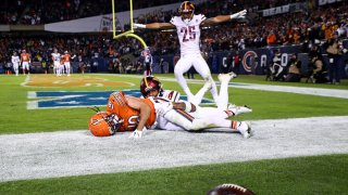 Darrick Forrest of the Washington Commanders breaks up a pass in the end zone intended for Dante Pettis of the Chicago Bears during the fourth quarter of an NFL football game at Soldier Field Oct. 13, 2022, in Chicago.