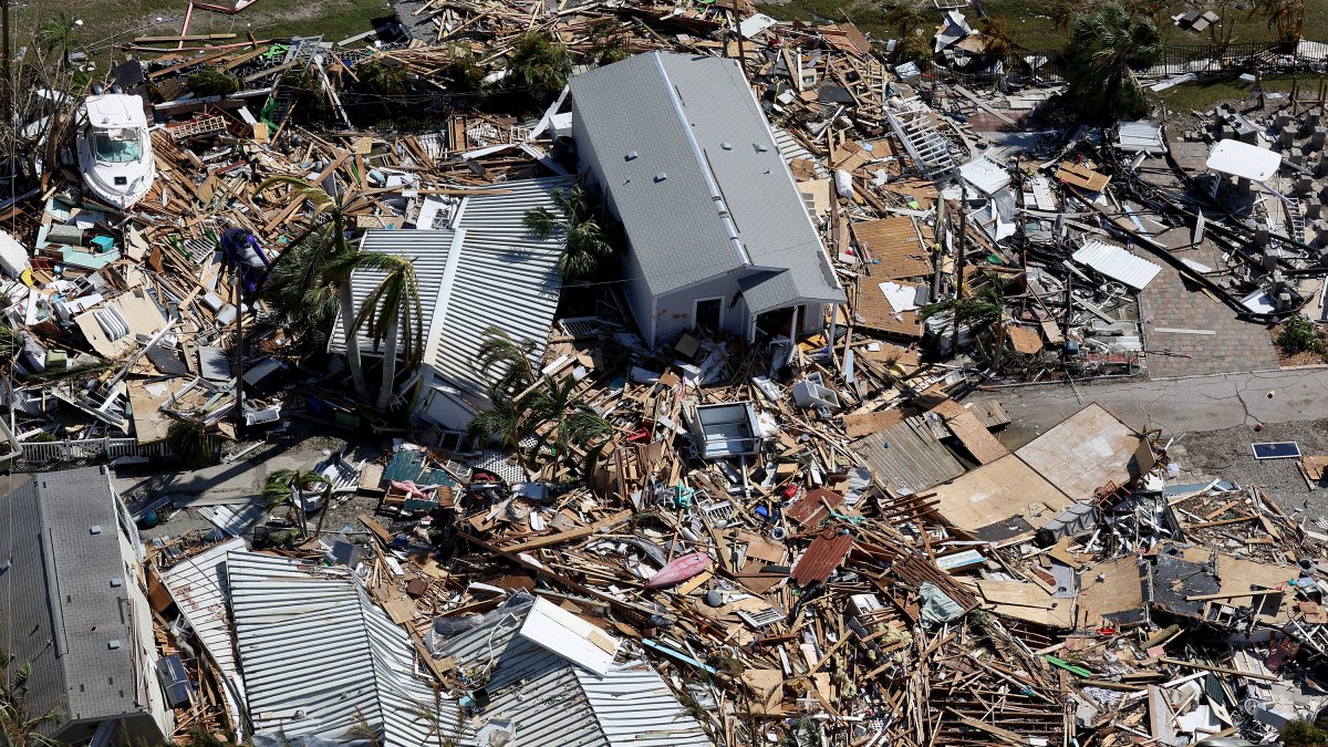 Poor Florida Neighborhood Battered by Flood From Ian Tries to Recover ...