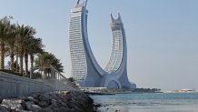 A general view shows the Katara Towers in the Qatari coastal city of Lusail on October 1, 2022, ahead of the Qatar 2022 FIFA World Cup. - Fifty days before the World Cup kicks off in Qatar, workers are pouring concrete and hammering through the night to ready luxury hotels and bargain apartments for a million or more football fans. (Photo by Karim JAAFAR / AFP) (Photo by KARIM JAAFAR/AFP via Getty Images)