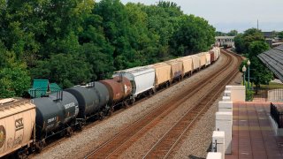 Train cars on rails passing through Lafayette, Indiana.