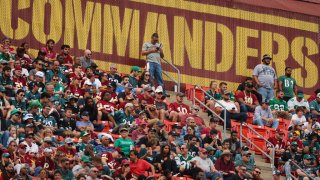 A general view of fans in front of the Washington Commanders logo during the first half of the game between the Washington Commanders and the Philadelphia Eagles at FedExField on September 25, 2022 in Landover, Maryland.